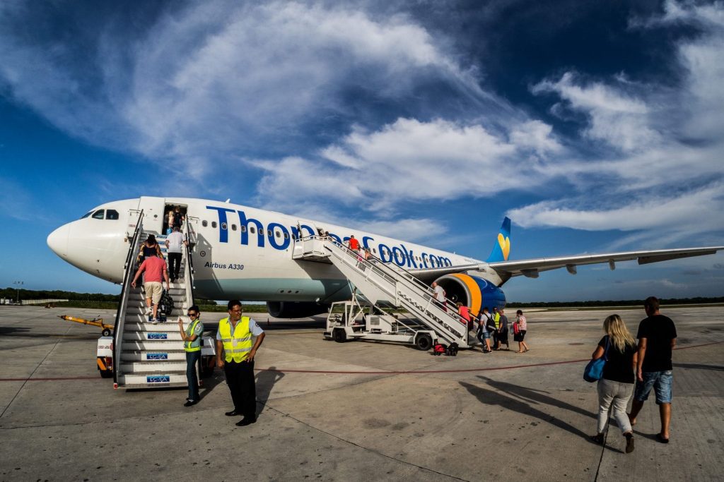 A Thomas Cook aircraft as seen in 2016 before the company's historic collapse three years later. Source: CWhatPhotos/Flickr https://www.flickr.com/photos/cwhatphotos/27282461284/in/photolist-HyRKew-afBHCX-9eBCRd-ZKeWrg-5Vktdp-auZvGb-bzijFX-WdP95j-T7QnCH-cxUFkh-WFfHZt-9mcCuG-oUa6pn-oE4gzK-LsNk1h-TiyL88-Jh1KfM-7wduNz-E7ofor-9Kh1oa-WBmkNw-6M12Nn-FWY7o5-VPPpHh-D7xr8e-5VjJQp-p7gJz8-k5kGMv-s9yhJD-FaFHrh-HmCJzn-9KjWwL-7knFpe-7wcDut-WeKg2R-exL7h6-jSdEFc-5GGR2b-7e115F-f9duM7-r1jhZD-eoUVhn-5VzFzn-8HM7bw-exfF7x-oUa76T-bZg5Zq-qPdKVP-jU2yJH-7xaTxz